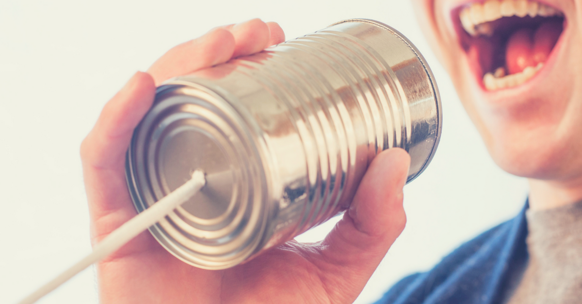Man speaking into can communication