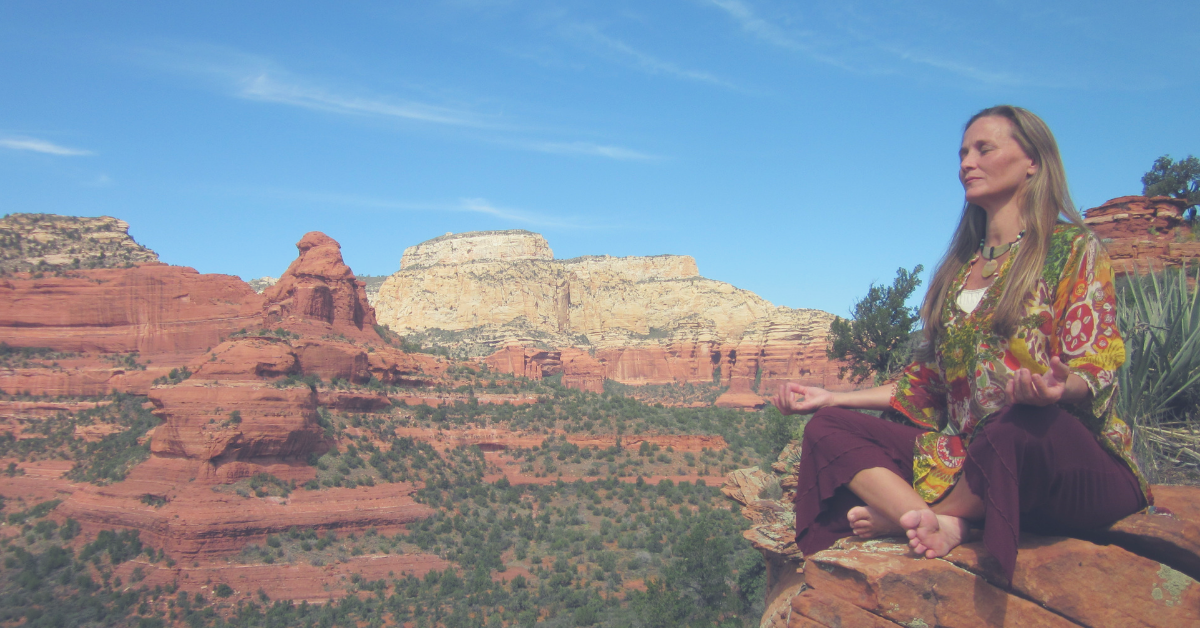 Anahata Ananda, founder of Shamangelic Healing, meditating in the desert