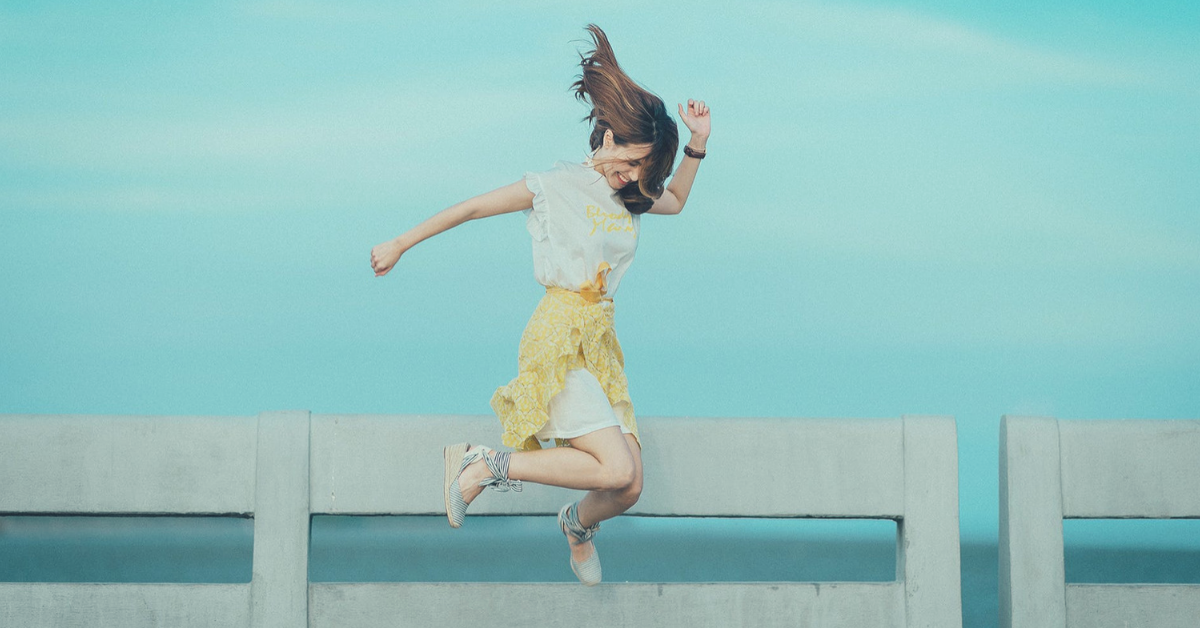 Girl Jumping Happy and Confident