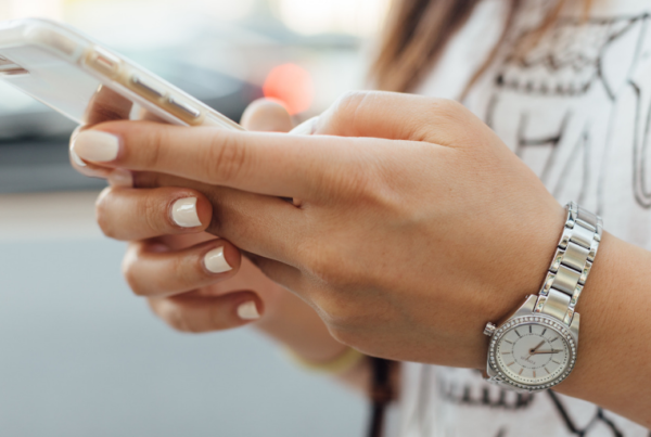 Woman testing on smartphone