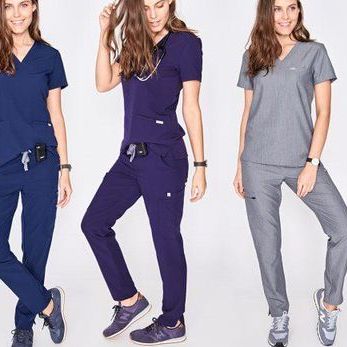 Women in stylish scrubs by FIGS